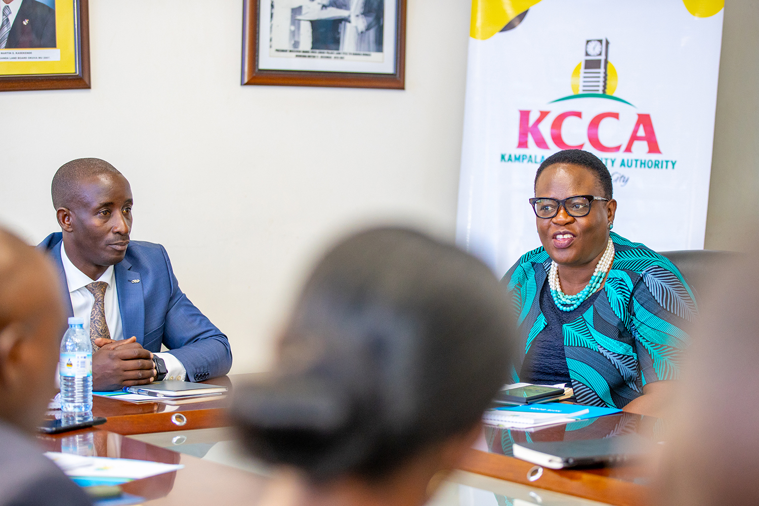 KCCA ED Dorothy Kisaka speaks during the meeting. On the left is Buganda Land Board CEO Omuk. SImon Kaboggoza