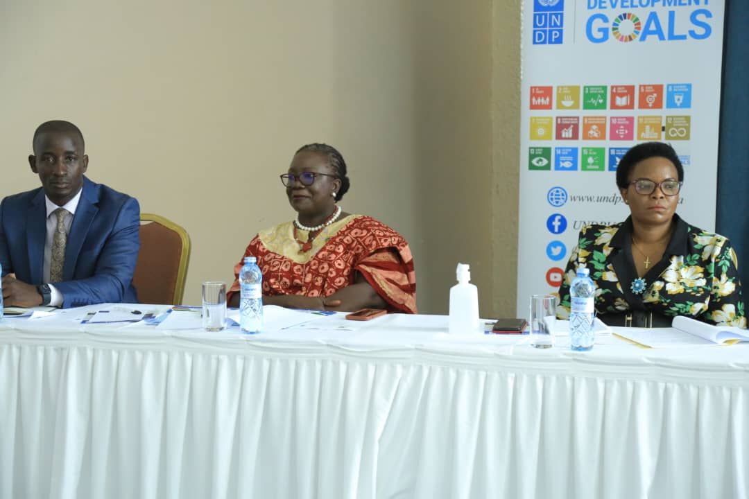 BUGANDA LAND BOARD CEO, OMUK. SIMON KABOGOZA (L), UNDP COUNTRY REPRESENTATIVE MS ELSIE ATTAFUAH (CENTRE) AND MINISTER OF STATE FOR LANDS HON PERSIS NAMUGANZA (R)